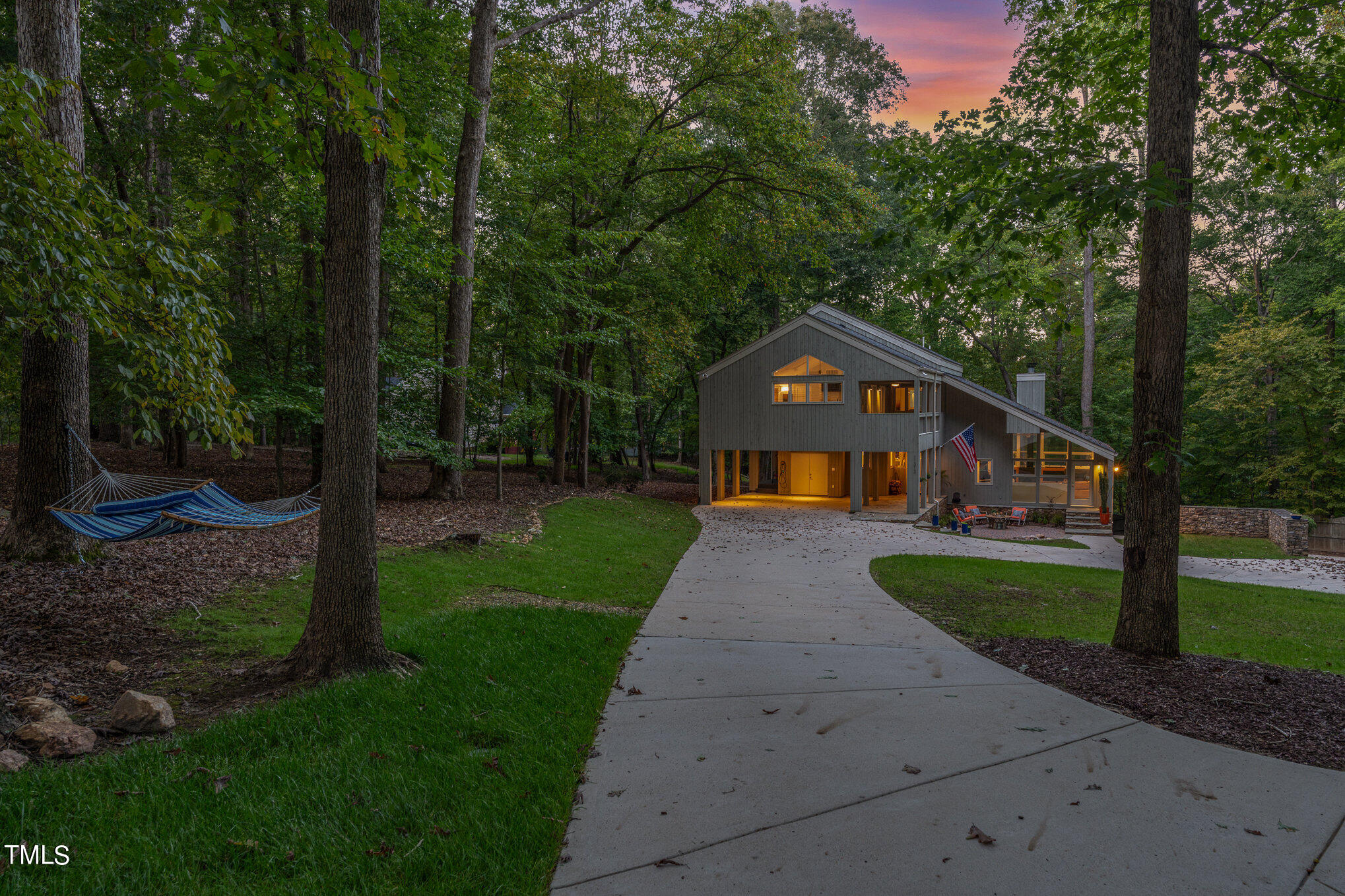 11312 Old Creedmoor Road Raleigh, NC 27613 - Photo 5 of 62 a front view of a house with garden