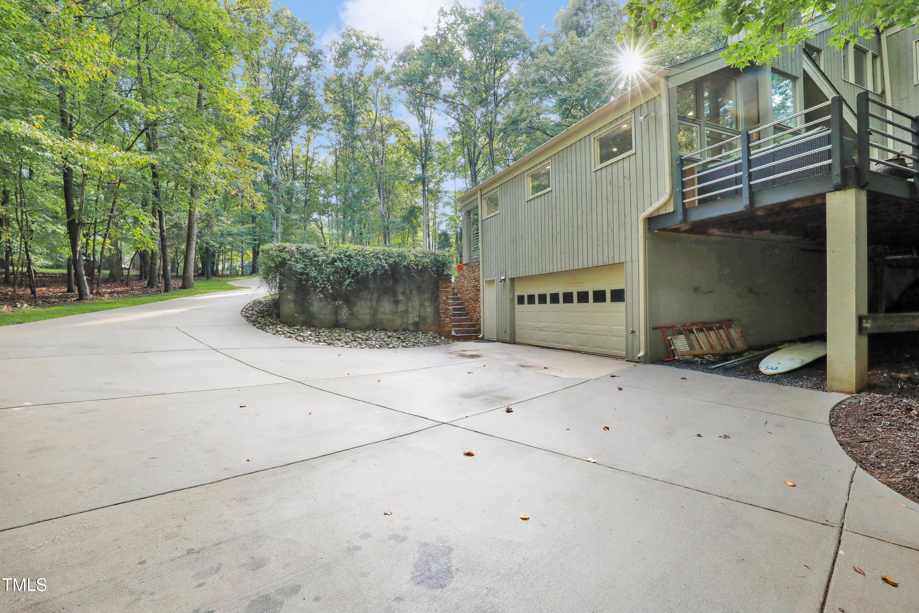 11312 Old Creedmoor Road Raleigh, NC 27613 - Photo 54 of 62 a view of a back yard of the house