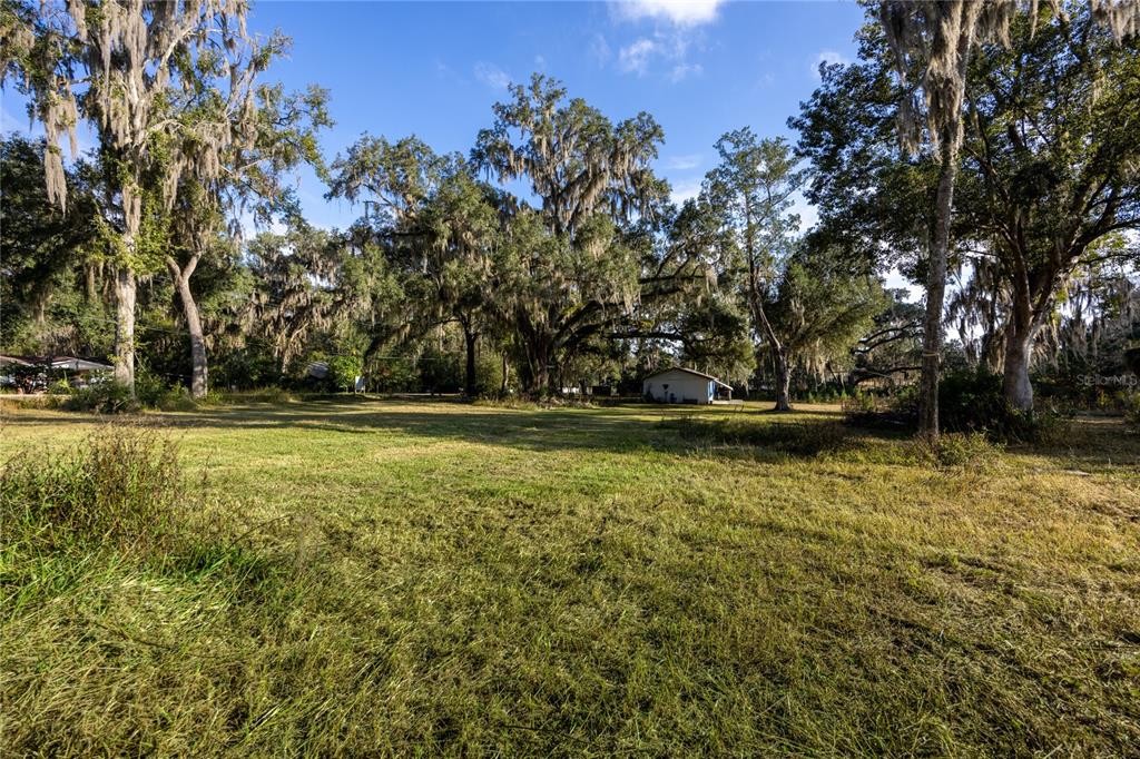 560 Northwest 39th Road Gainesville, FL 32607 - Photo 2 of 13 a view of outdoor space with deck