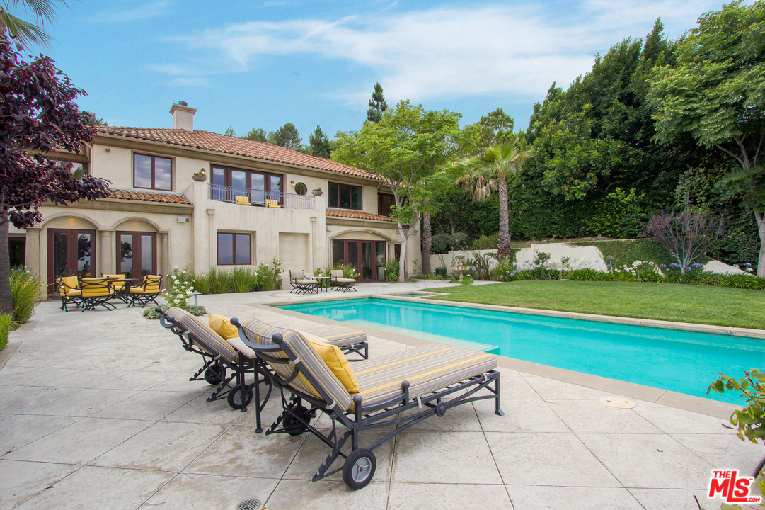 13951 Durham Road Beverly Hills, CA 90210 - Photo 21 of 29 a swimming pool with outdoor seating and yard