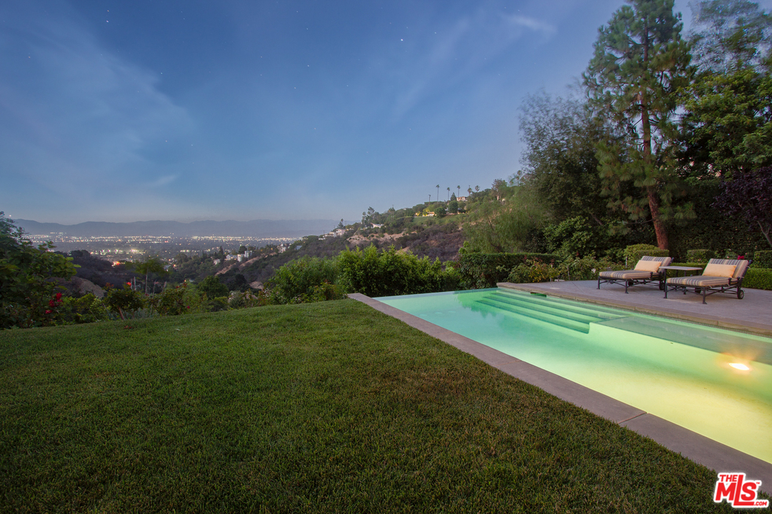 13951 Durham Road Beverly Hills, CA 90210 - Photo 24 of 29 a view of a lake with a yard