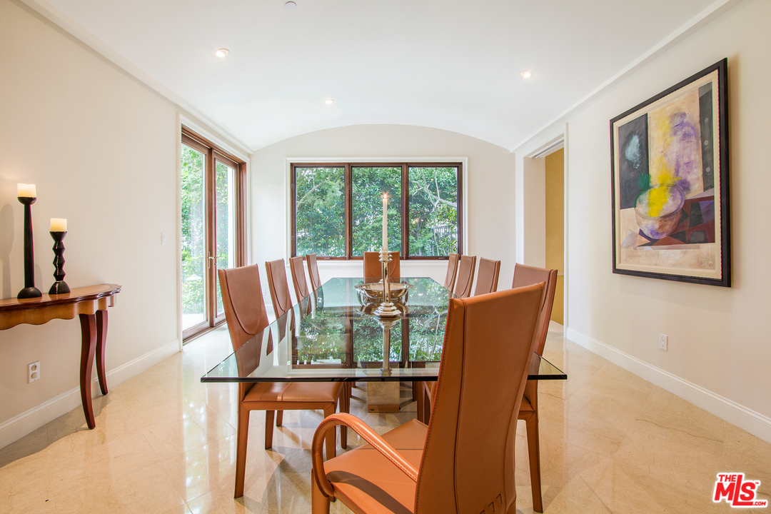 13951 Durham Road Beverly Hills, CA 90210 - Photo 6 of 29 a dining room with furniture window and outside view