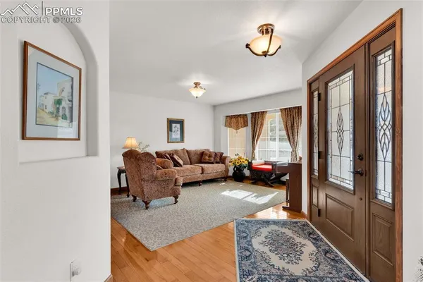 a living room with furniture and a window