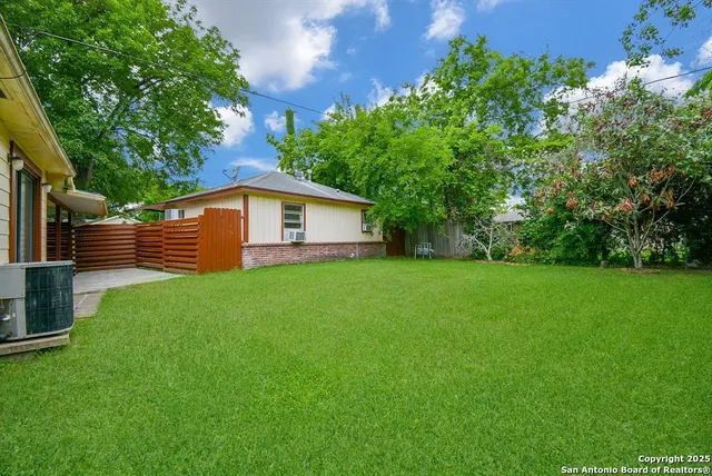 a view of a backyard with a garden