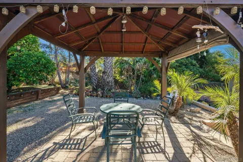 a view of a balcony with chairs