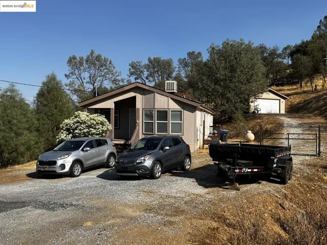 a car parked in front of a house