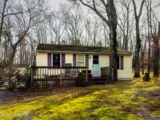 a front view of a house with a patio