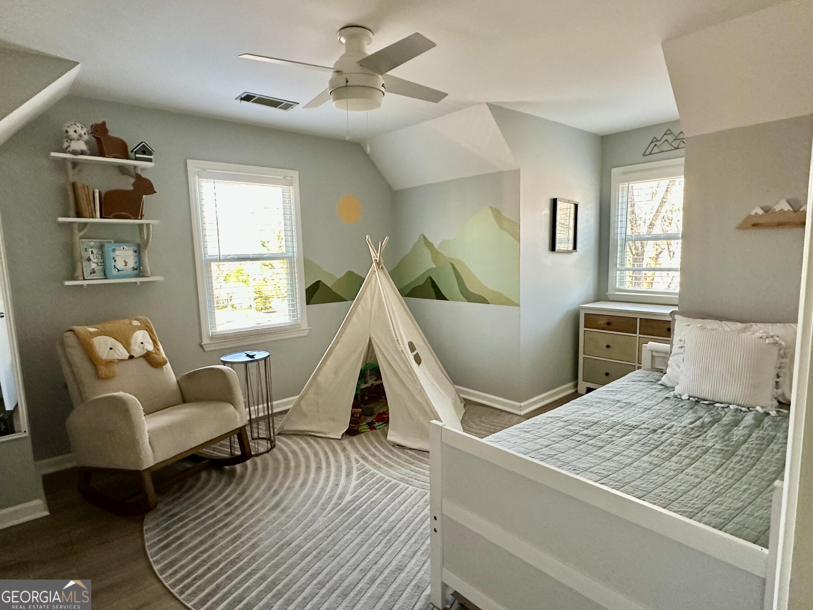 2015 Commonwealth Road Cumming, GA 30041 - Photo 14 of 22 a living room with a bed furniture and a window