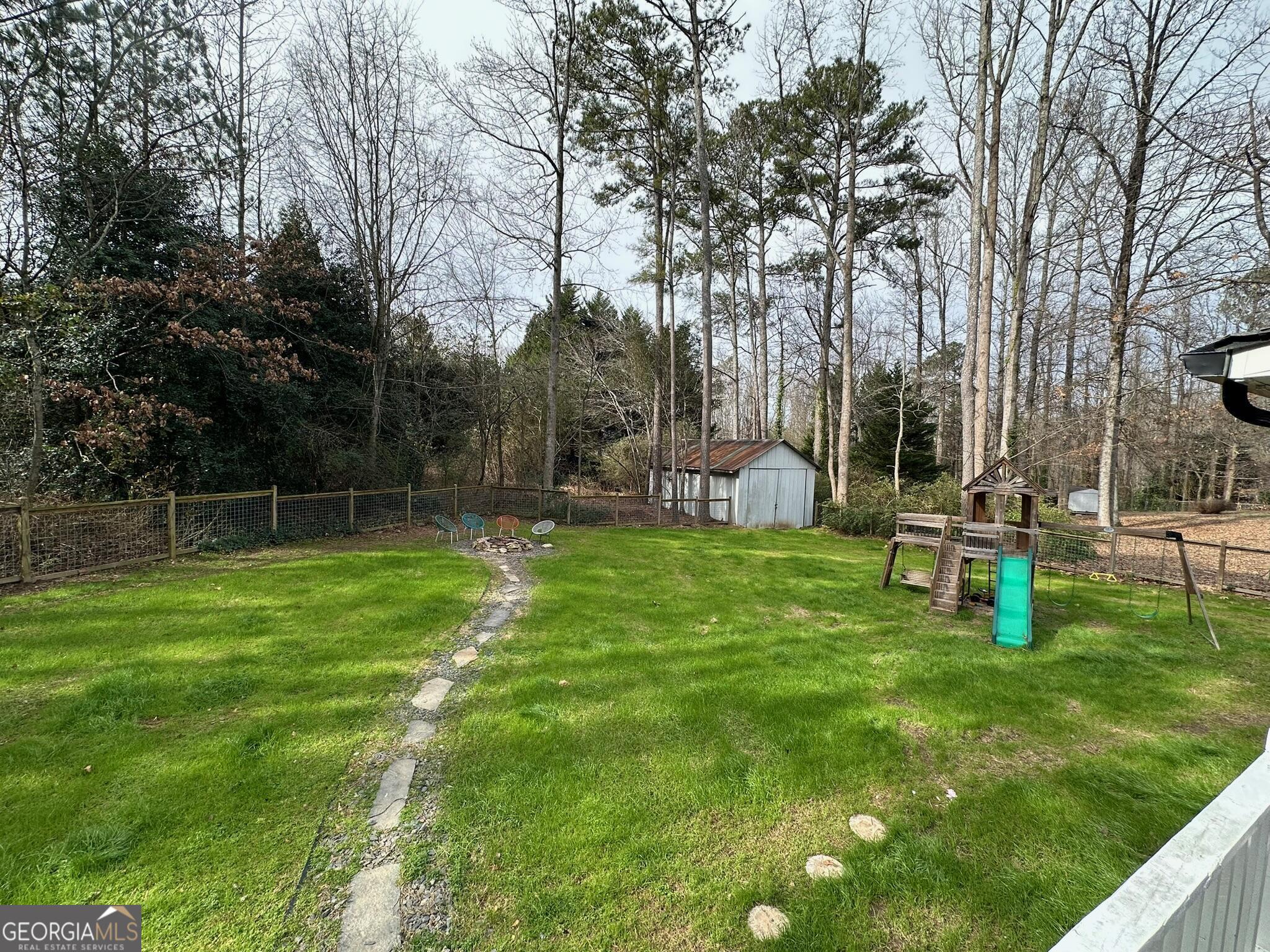 2015 Commonwealth Road Cumming, GA 30041 - Photo 19 of 22 a view of a park with large trees