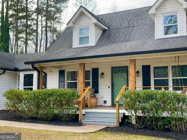 front view of a house with a small yard