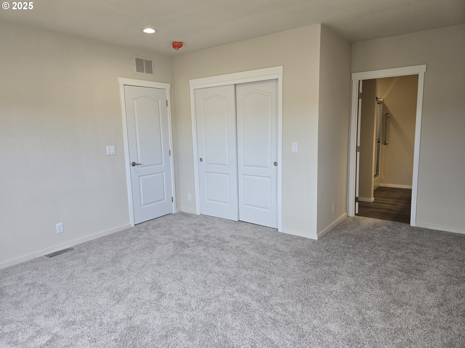 1447 53rd Street Florence, OR 97439 - Photo 14 of 25 a view of an empty room and closet area