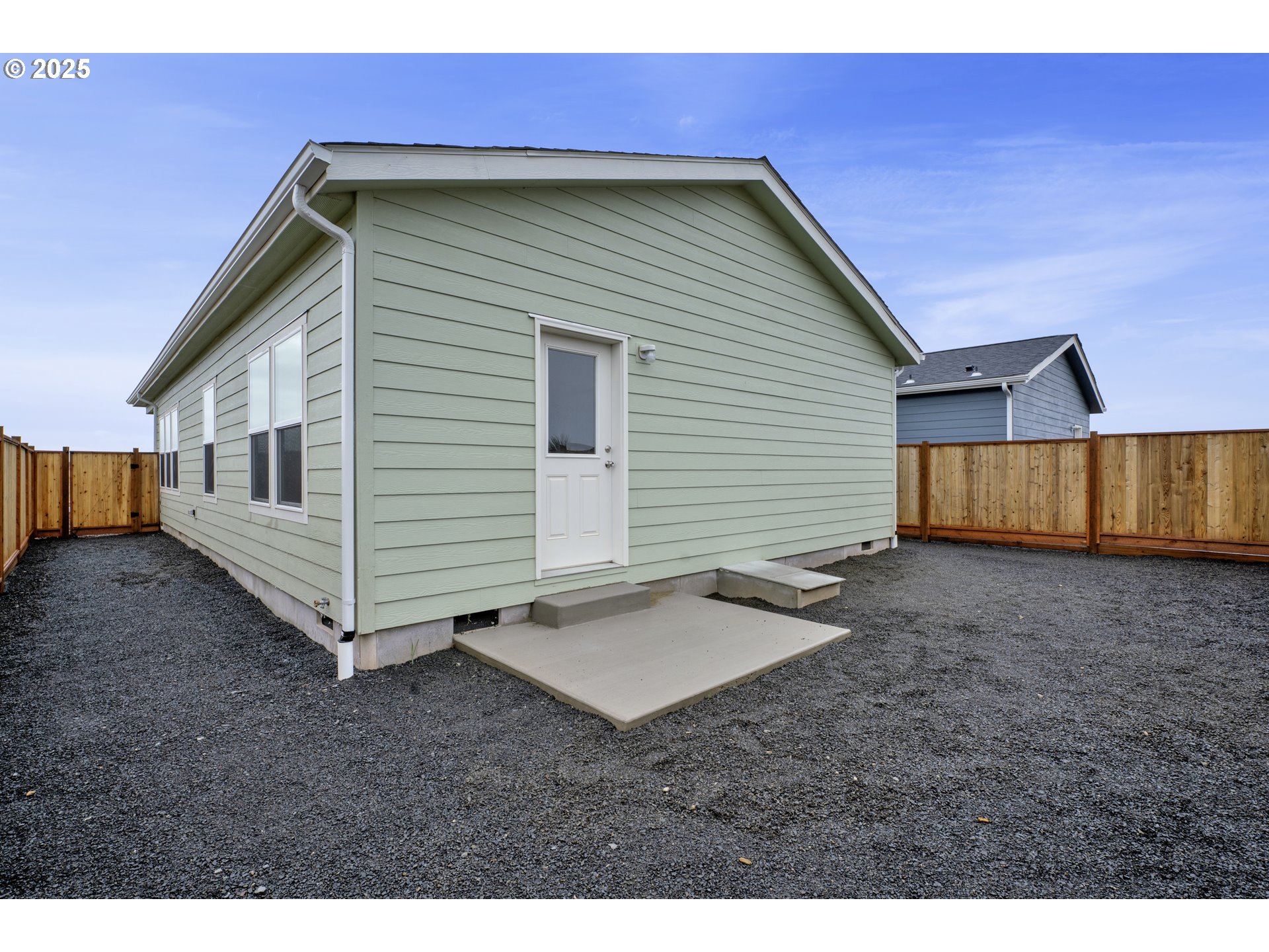 1447 53rd Street Florence, OR 97439 - Photo 23 of 25 a view of a house with backyard