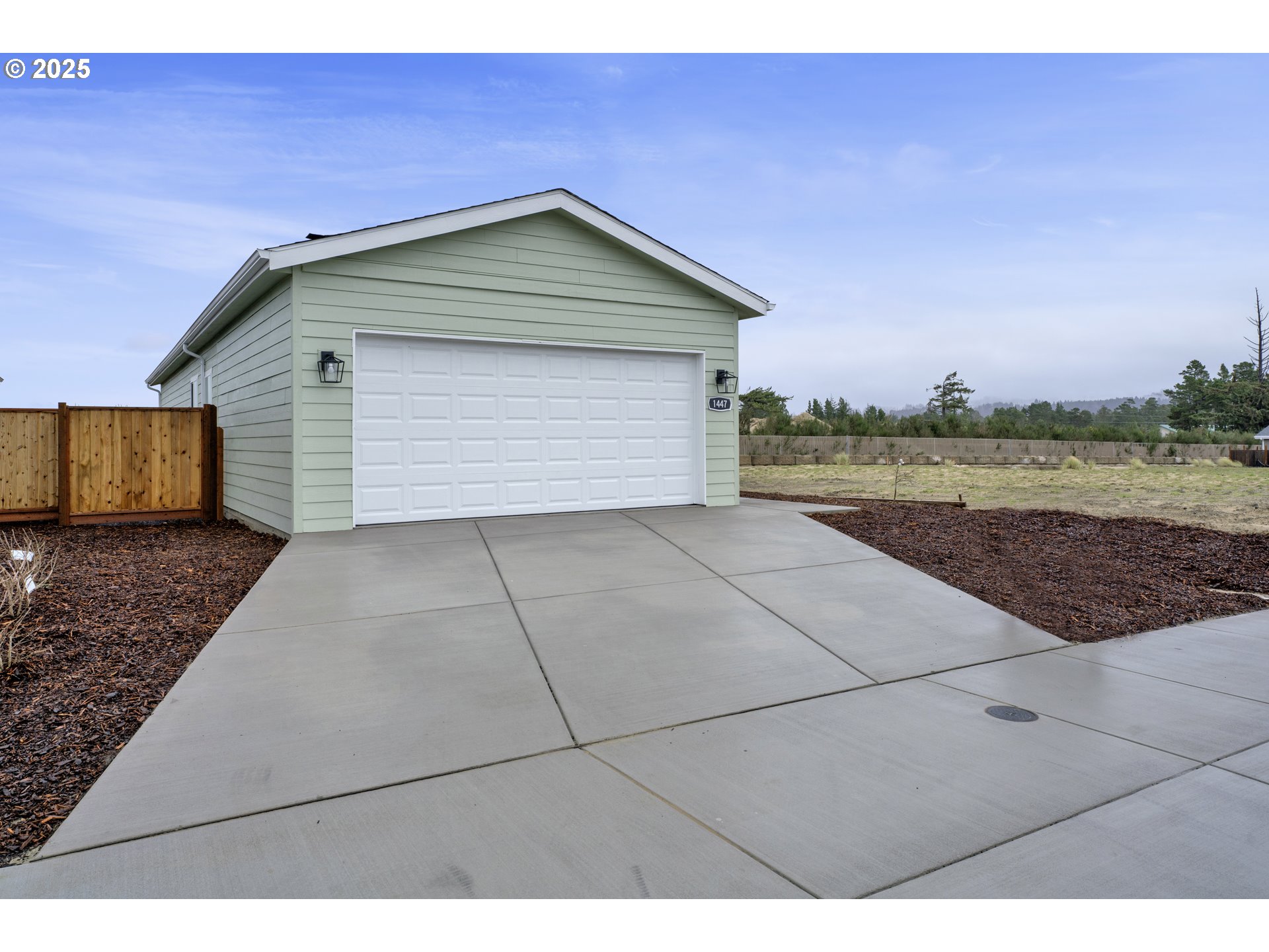 1447 53rd Street Florence, OR 97439 - Photo 25 of 25 a house view with a outdoor space