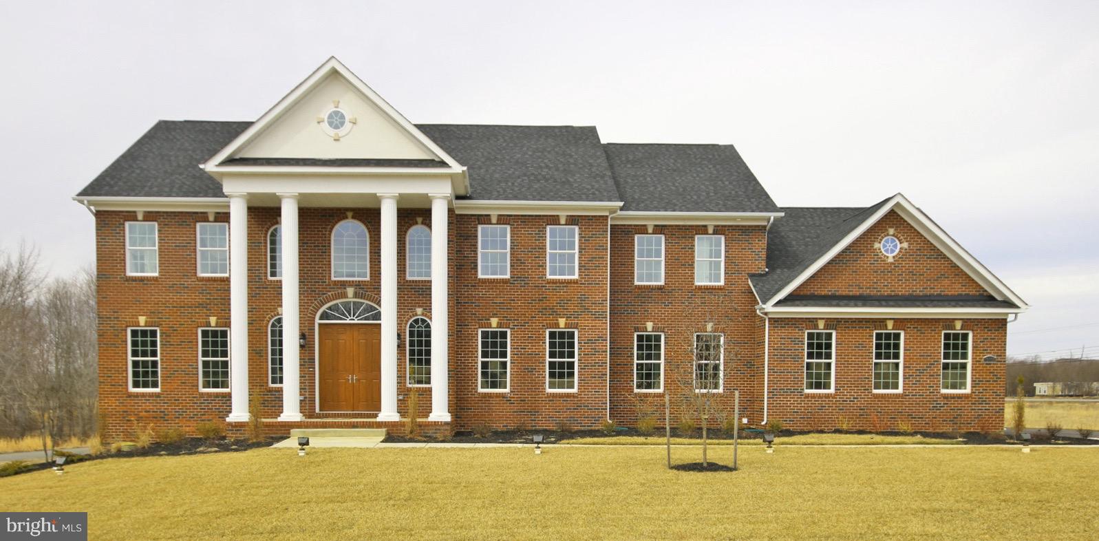 2033 Rosetta Way Davidsonville, MD 21035 - Photo 11 of 15 a front view of a house with a yard