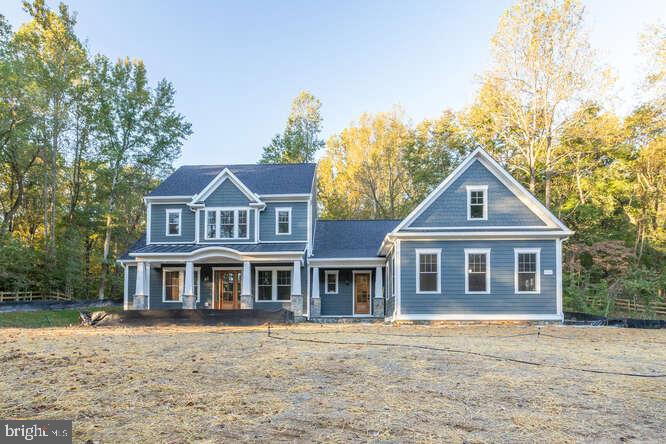 2033 Rosetta Way Davidsonville, MD 21035 - Photo 12 of 15 front view of a house with a yard