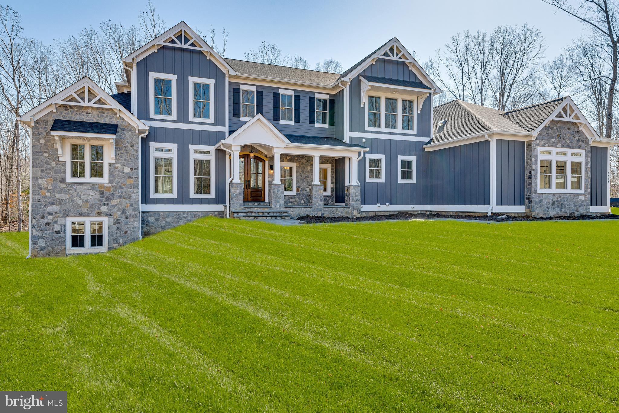2033 Rosetta Way Davidsonville, MD 21035 - Photo 13 of 15 a front view of a house with a yard
