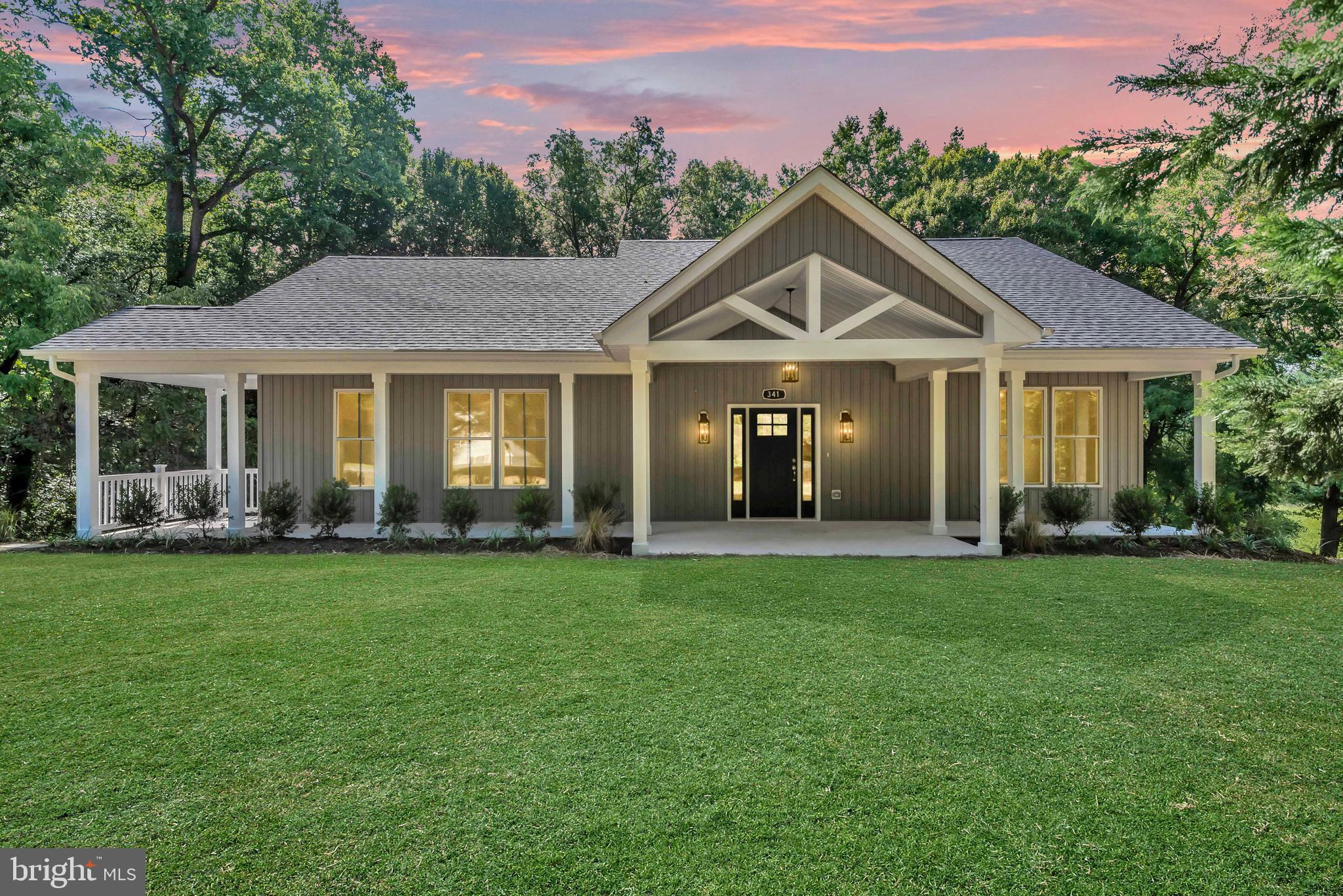 2033 Rosetta Way Davidsonville, MD 21035 - Photo 14 of 15 a front view of a house with yard and green space