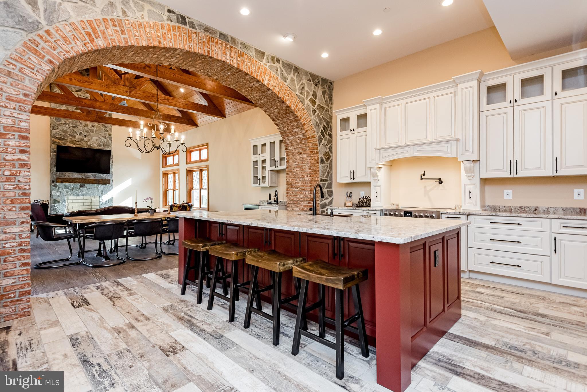 2033 Rosetta Way Davidsonville, MD 21035 - Photo 8 of 15 a kitchen with stainless steel appliances granite countertop a stove and a wooden floors