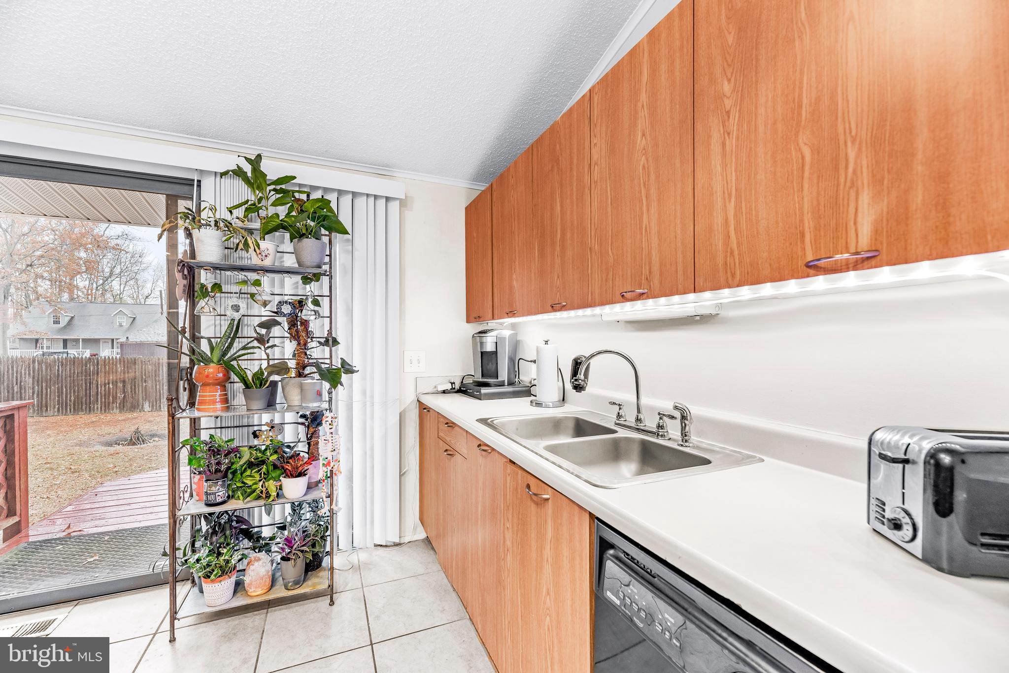 4912 Beech Street Shady Side, MD 20764 - Photo 18 of 34 Sliding Glass Doors to backyard deck