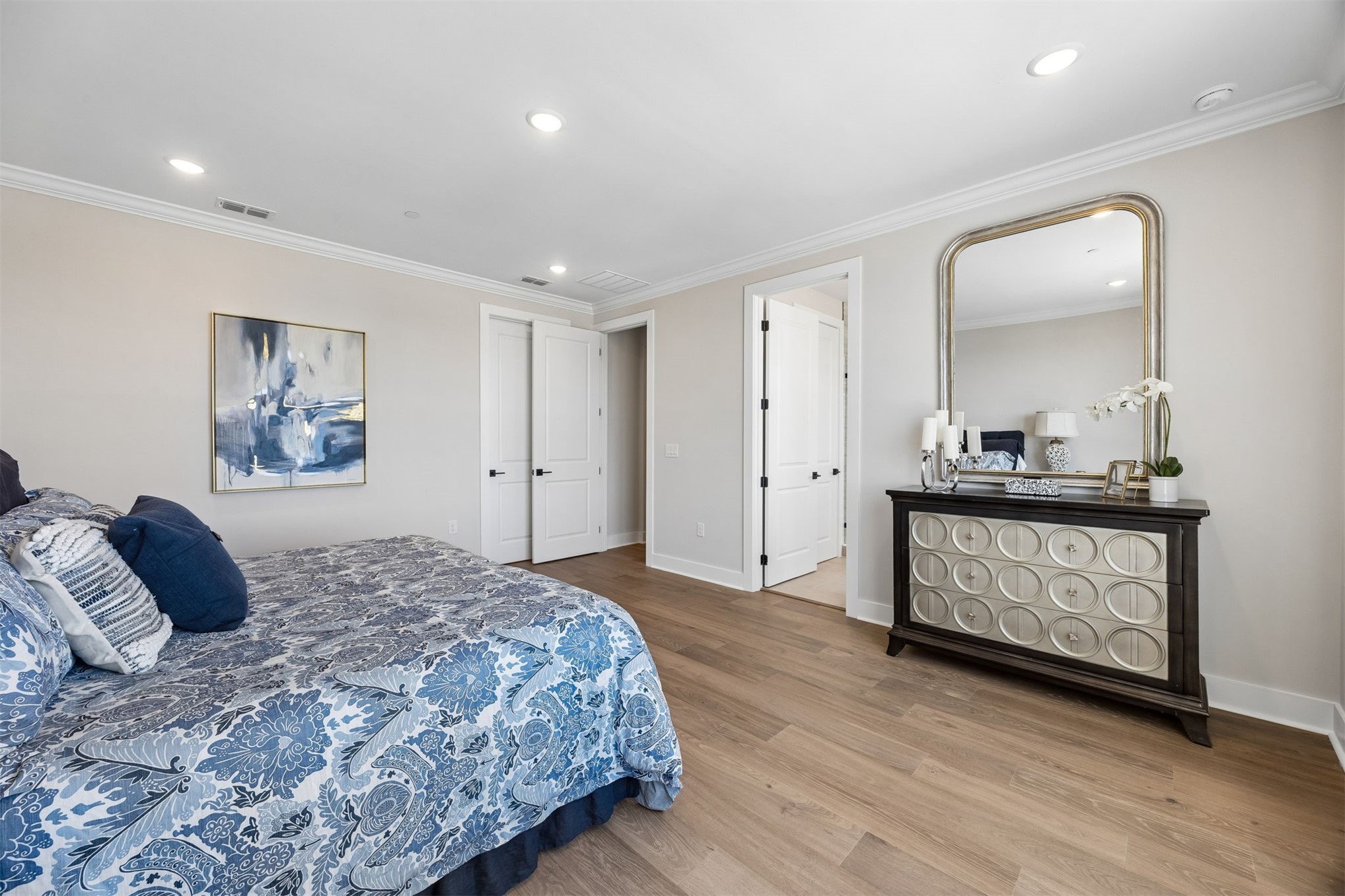 23 North 2nd Street Fernandina Beach, FL 32034 - Photo 35 of 74 a bedroom with a bed and a painting on the wall