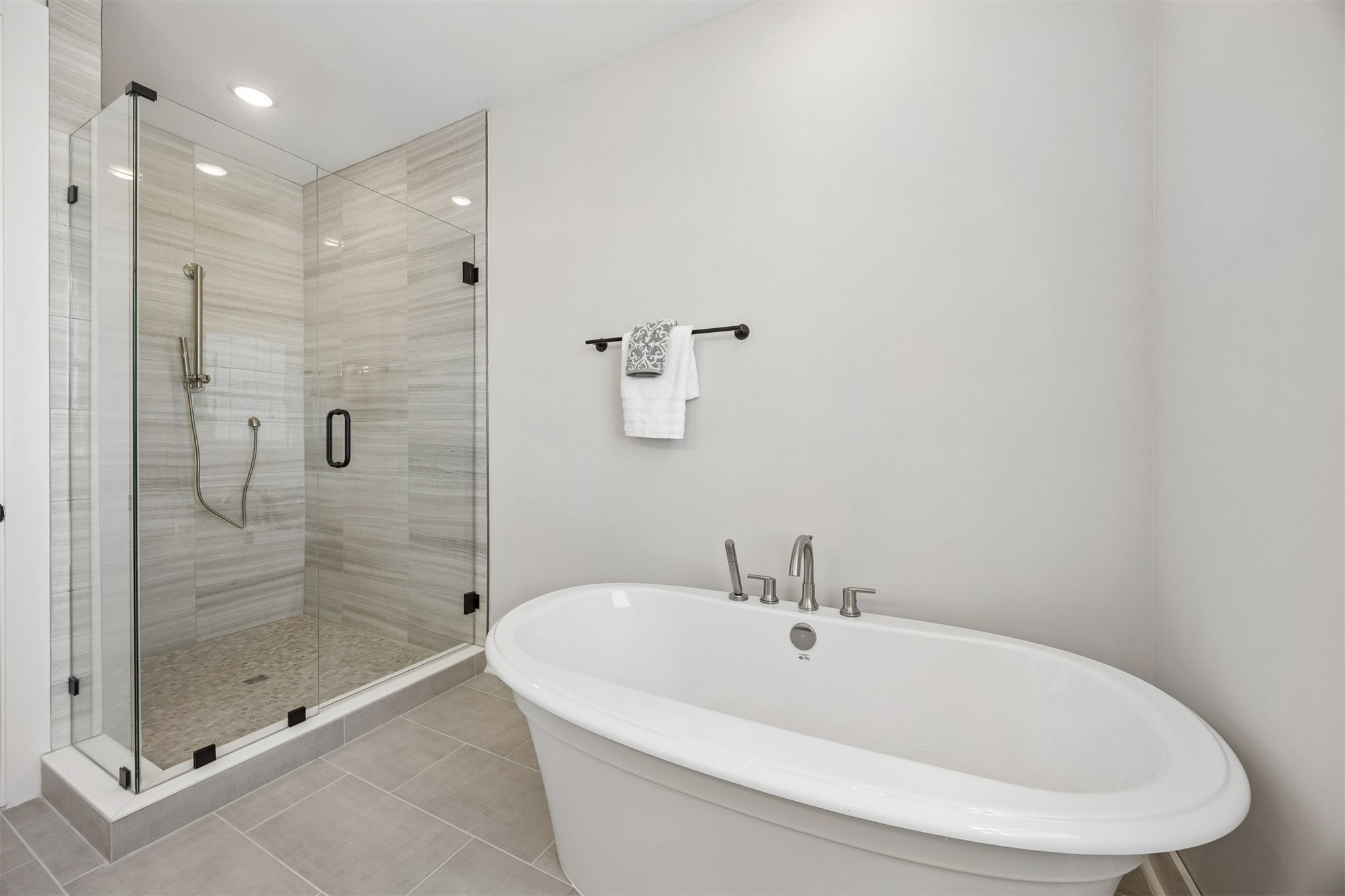 23 North 2nd Street Fernandina Beach, FL 32034 - Photo 40 of 74 a white bath tub sitting next to a shower