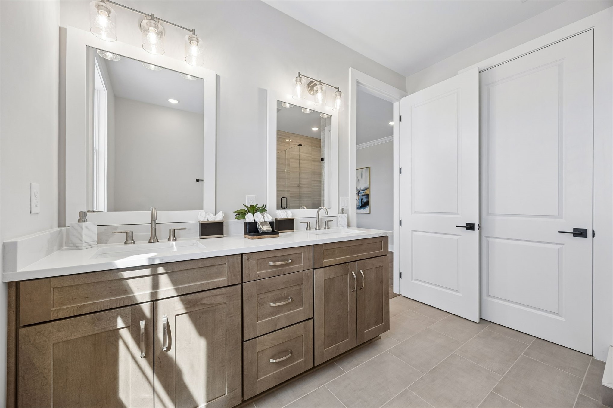 23 North 2nd Street Fernandina Beach, FL 32034 - Photo 41 of 74 a spacious bathroom with a double vanity sink a mirror and a