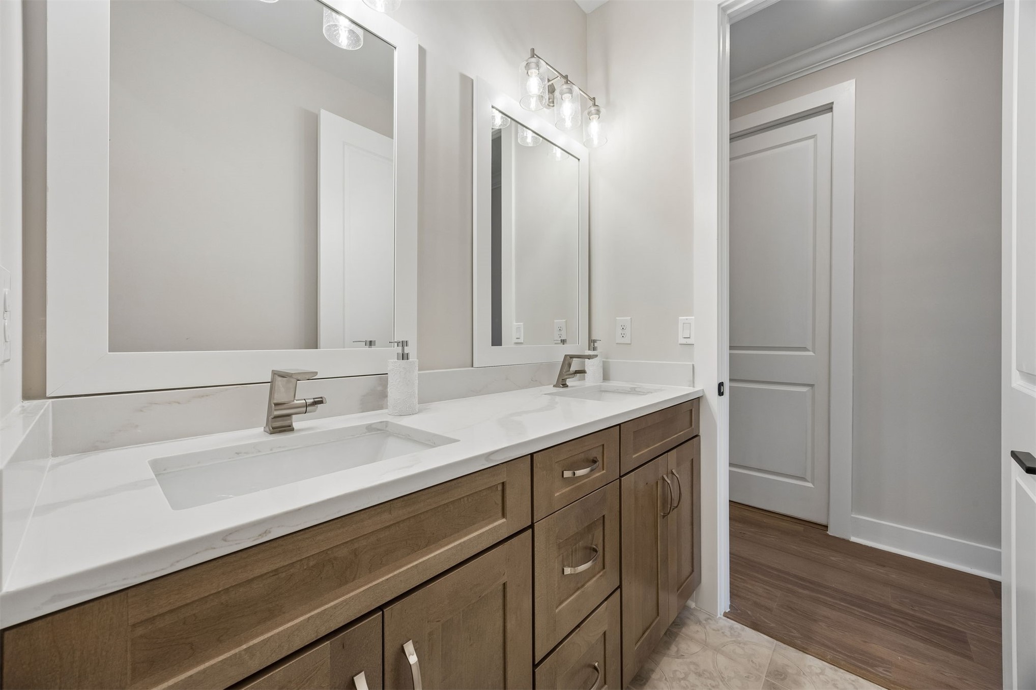 23 North 2nd Street Fernandina Beach, FL 32034 - Photo 52 of 74 a bathroom with a double vanity sink and a mirror