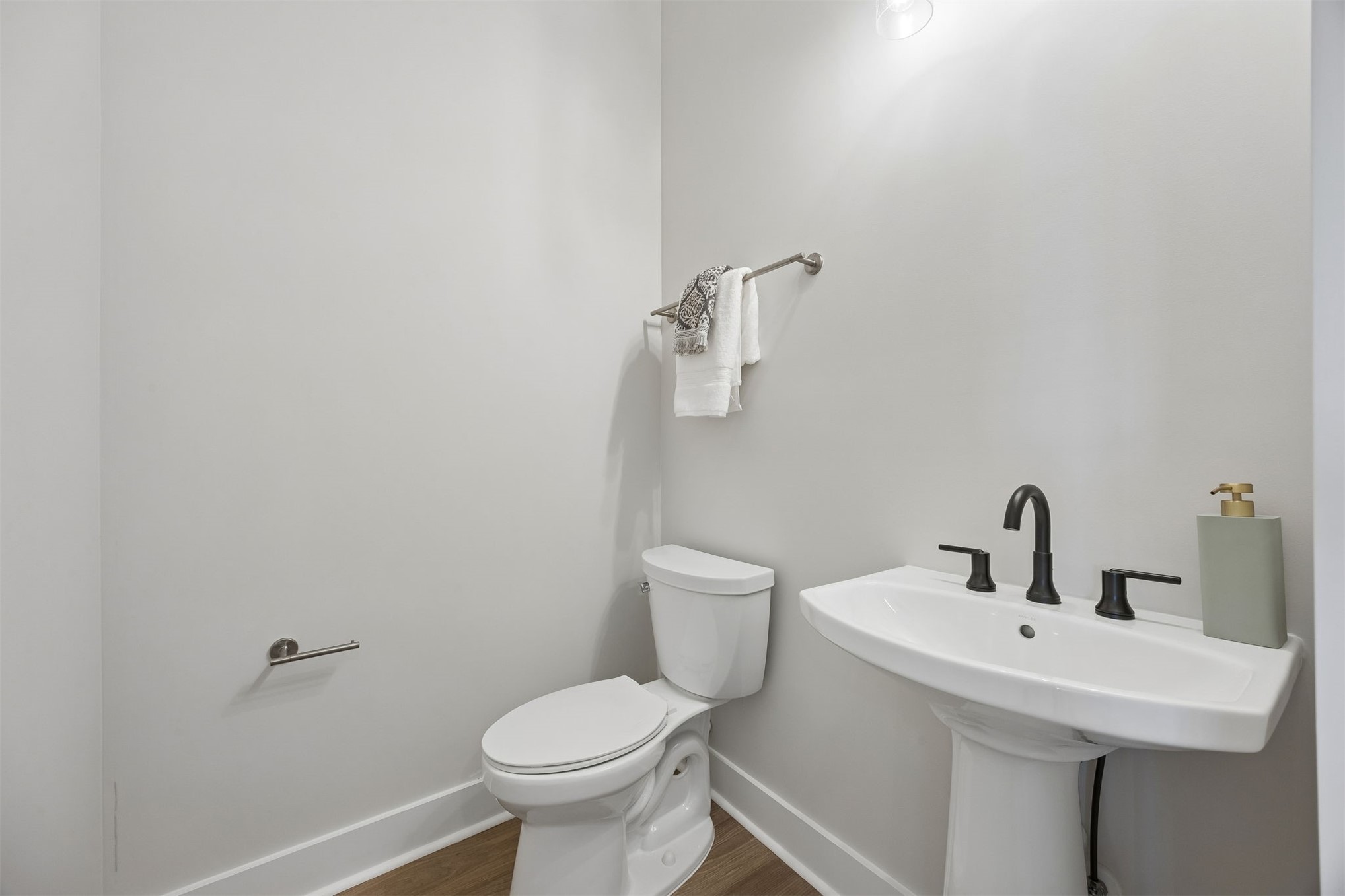 23 North 2nd Street Fernandina Beach, FL 32034 - Photo 54 of 74 a bathroom with a sink mirror and toilet