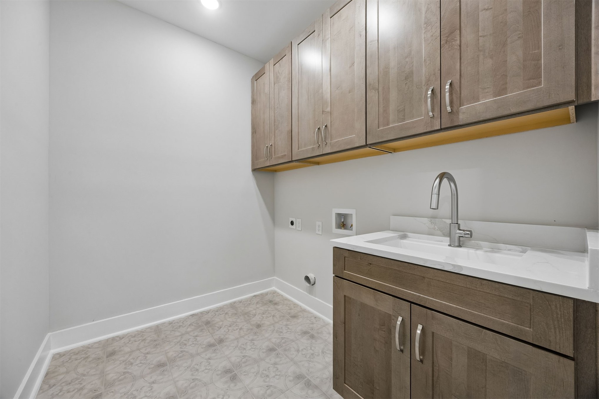 23 North 2nd Street Fernandina Beach, FL 32034 - Photo 56 of 74 a kitchen with a sink and cabinets