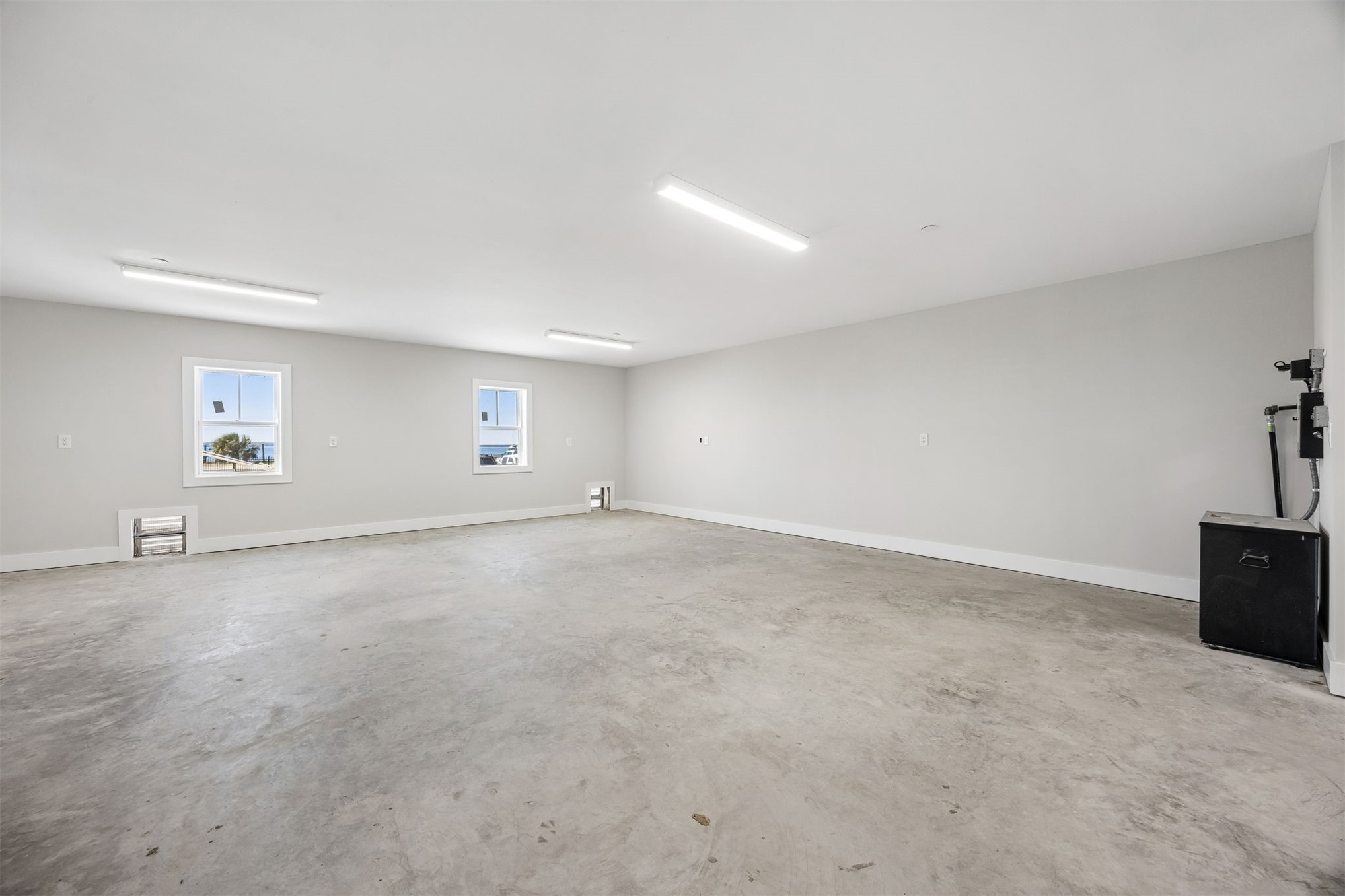 23 North 2nd Street Fernandina Beach, FL 32034 - Photo 57 of 74 a view of an empty room with windows