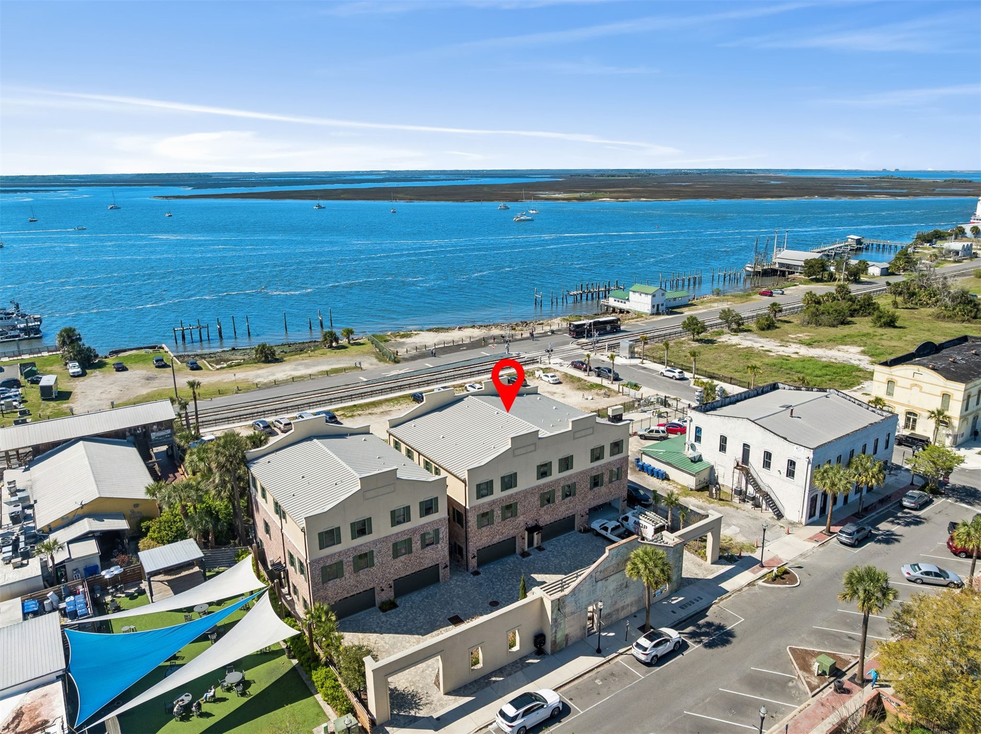 23 North 2nd Street Fernandina Beach, FL 32034 - Photo 66 of 74 an aerial view of a building with an outdoor space and seating