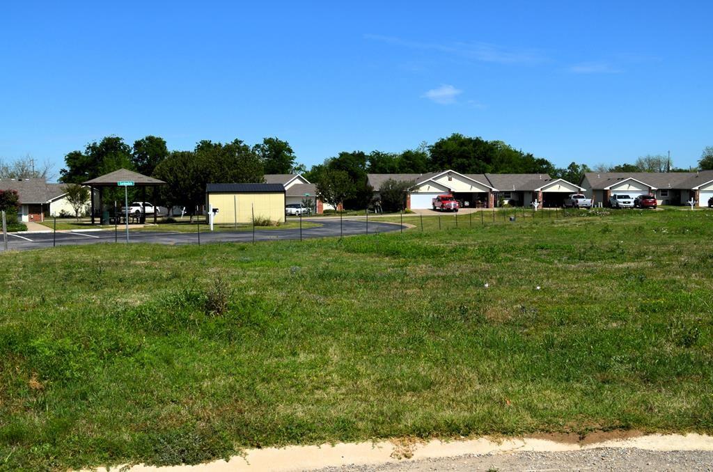 206 Preston Road Mabank, TX 75147 - Photo 1 of 5 a front view of a house with a yard