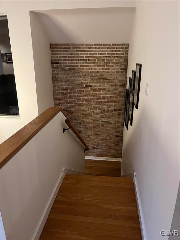 6997 Wimmer Road Bethlehem, PA 18015 - Photo 26 of 44 Front staircase with exposed brick