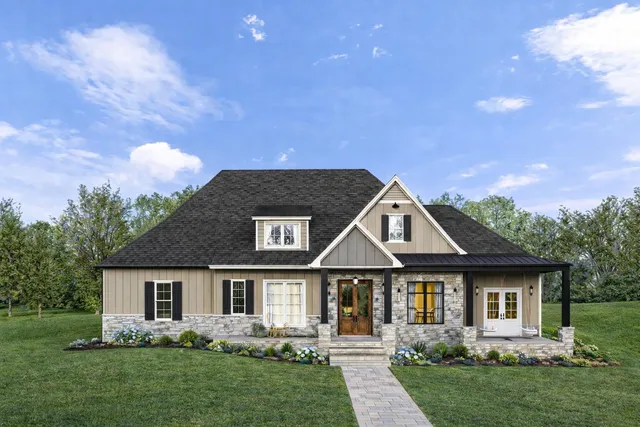 a front view of a house with garden