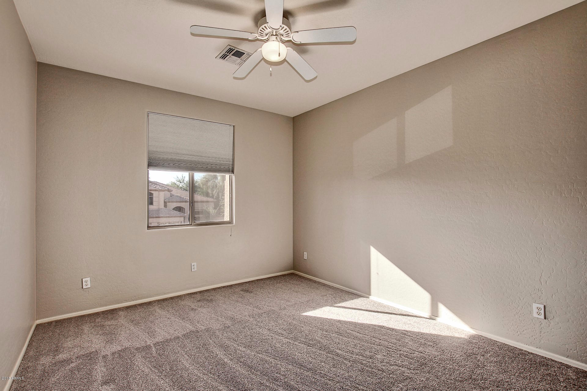 1360 East Harrison Street Gilbert, AZ 85295 - Photo 29 of 34 a view of an empty room with a window