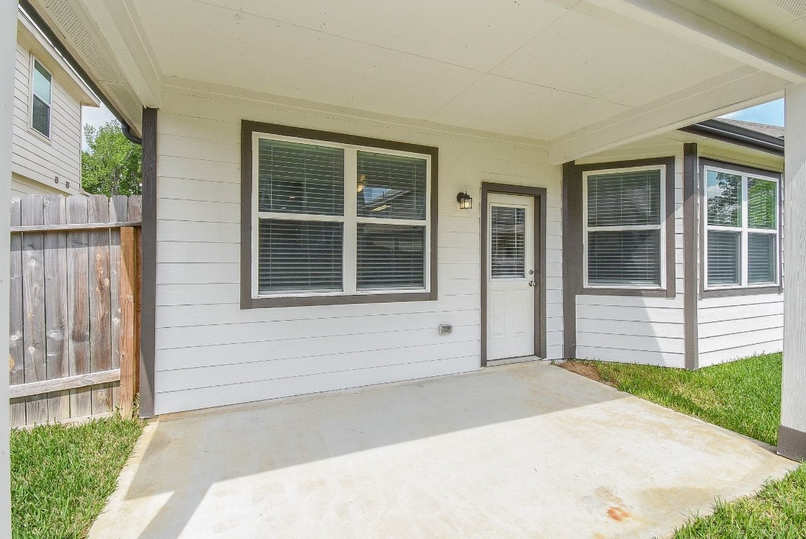 13534 Luke Prairie Willis, TX 77378 - Photo 29 of 32 covered back porch