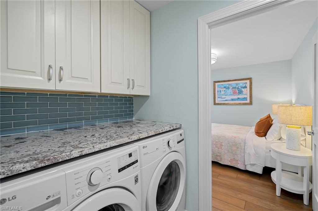 2218 Kings Lake Boulevard Naples, FL 34112 - Photo 23 of 50 a view of livingroom with washer and dryer