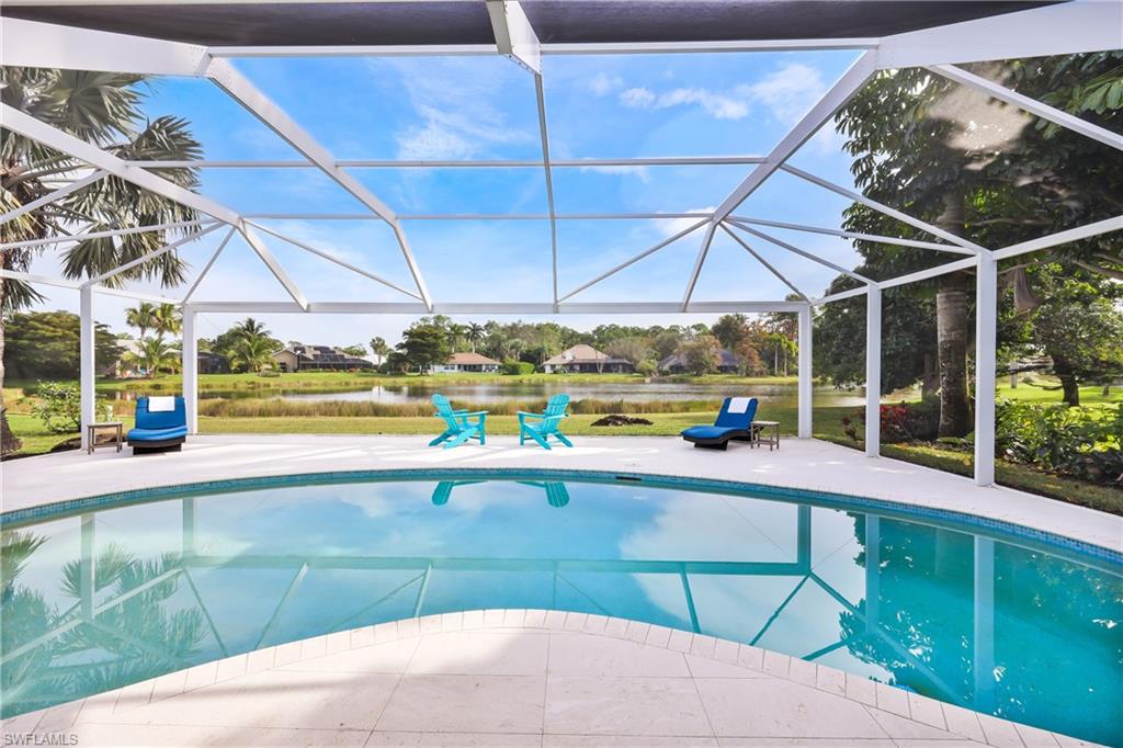 2218 Kings Lake Boulevard Naples, FL 34112 - Photo 7 of 50 a view of a indoor swimming pool