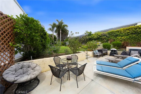 a view of a backyard with a patio