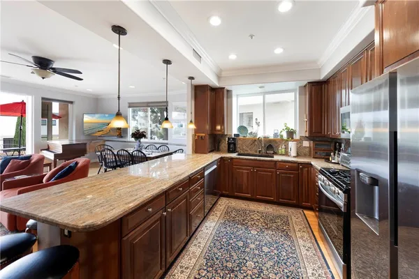 a very nice looking kitchen with a large window