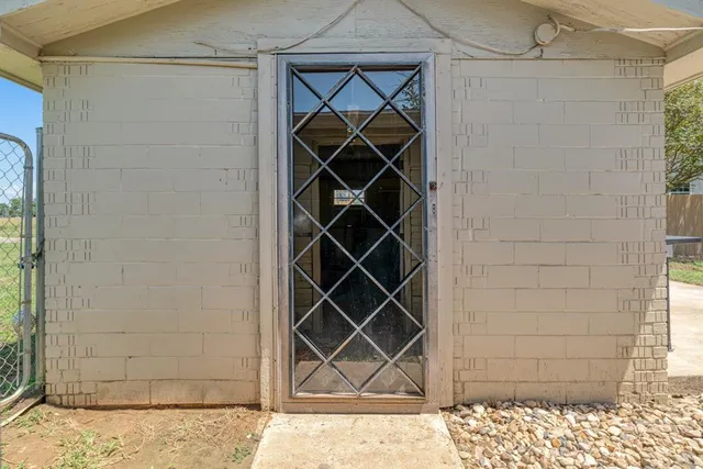 a house with trees in the background