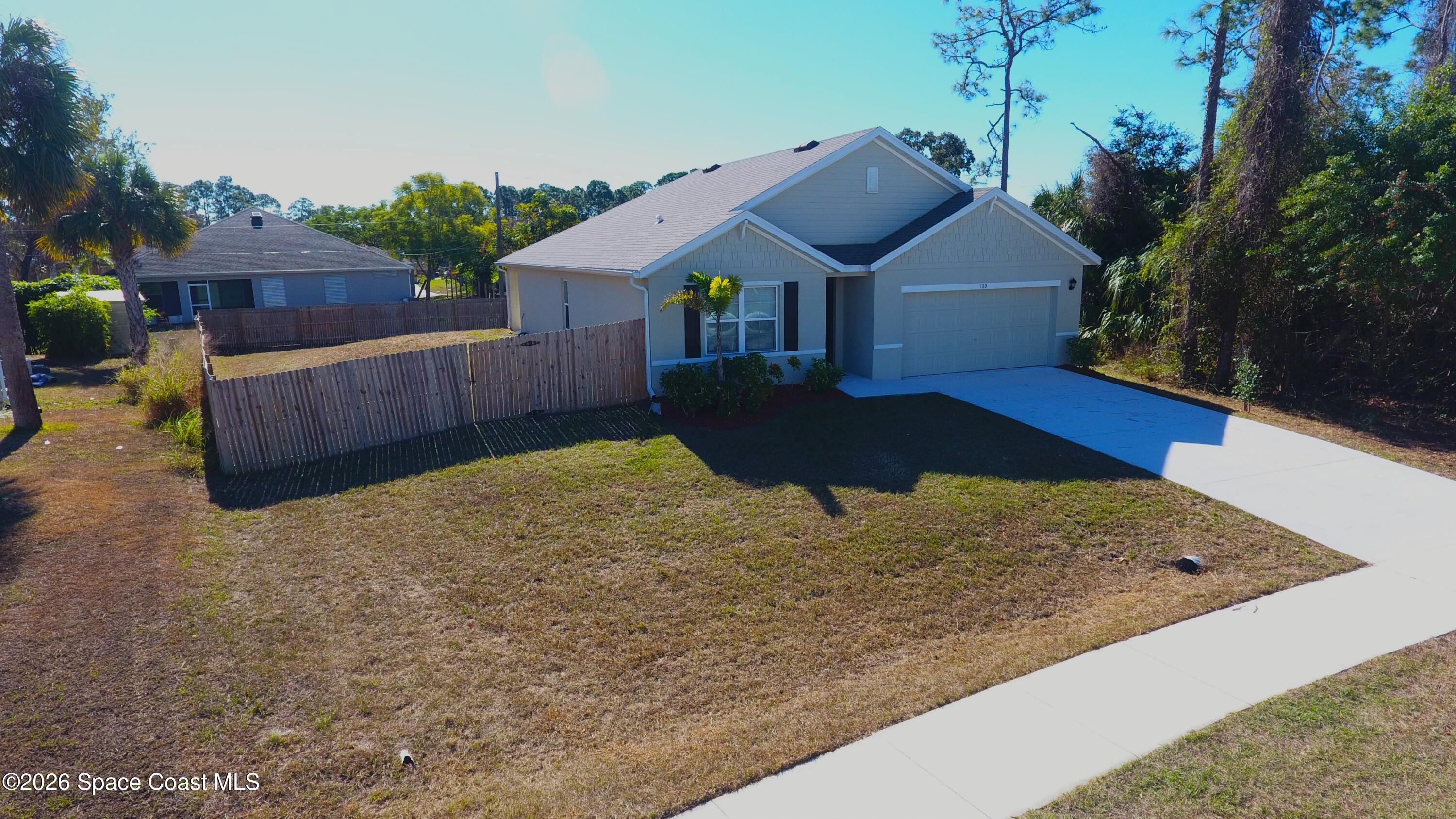 180 Hammock Road Southeast Palm Bay, FL 32909 - Photo 2 of 21 DJI_0237