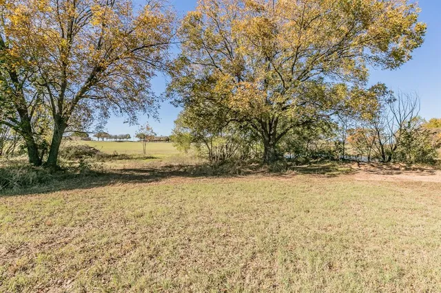 a view of parking garage with cars
