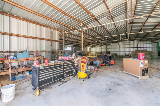 a view of swimming pool with outdoor seating