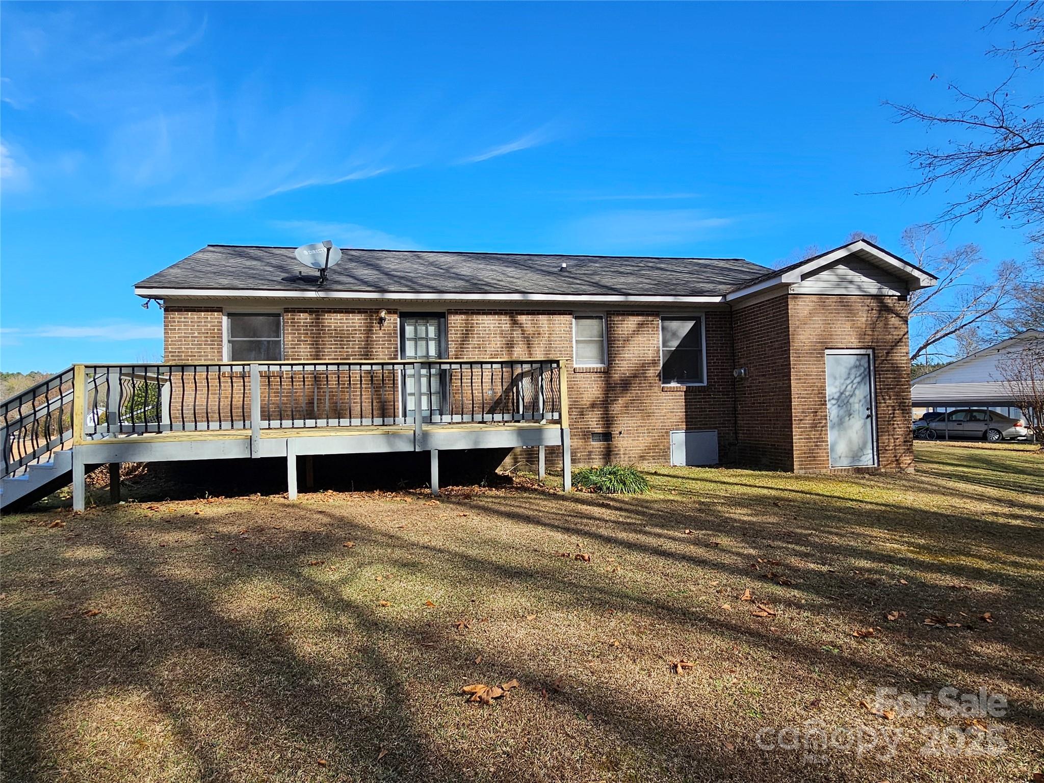 2486 Oxford Circle Lancaster, SC 29720 - Photo 16 of 17 a view of a house with a yard