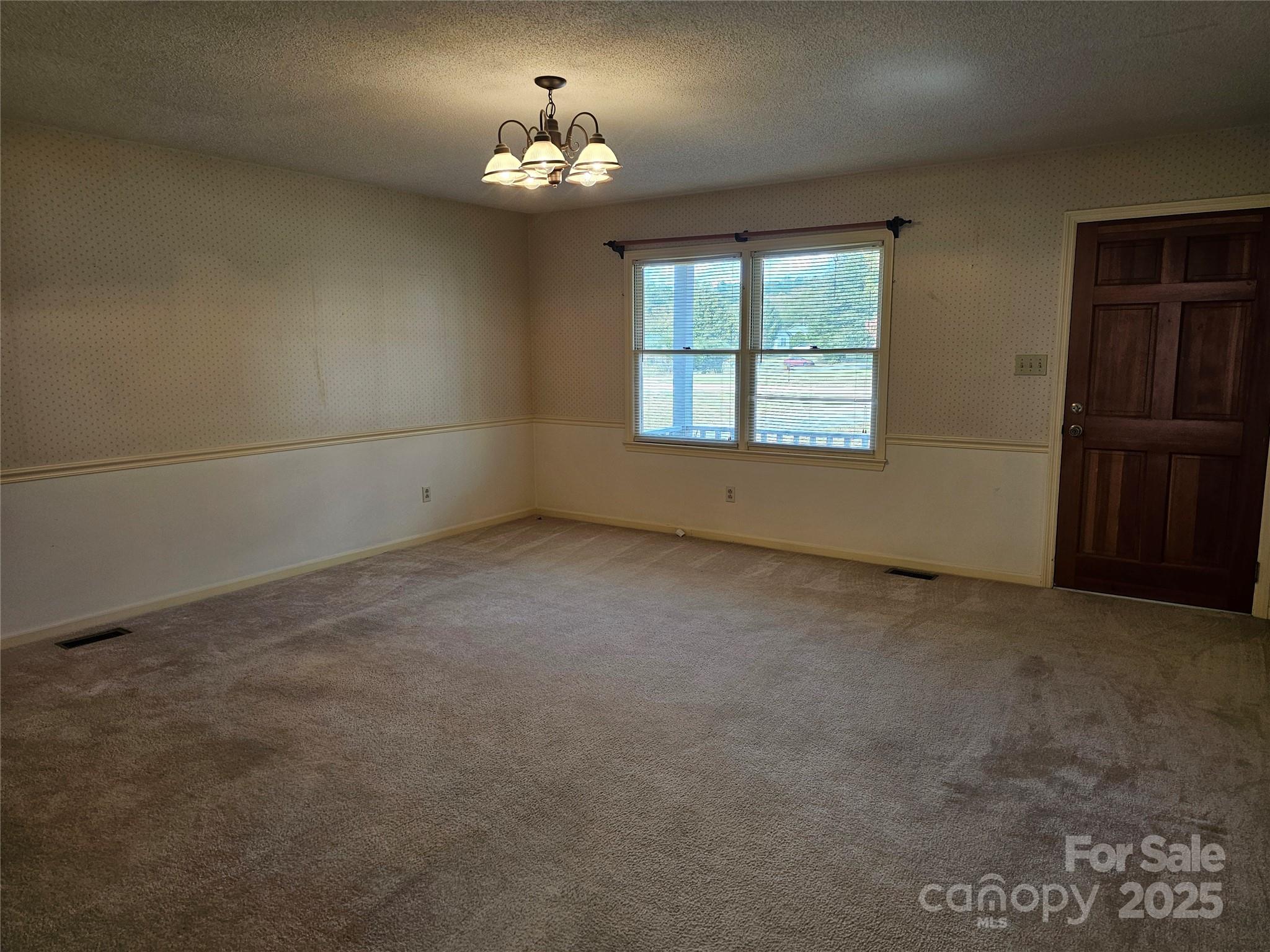 2486 Oxford Circle Lancaster, SC 29720 - Photo 3 of 17 a view of empty room with windows
