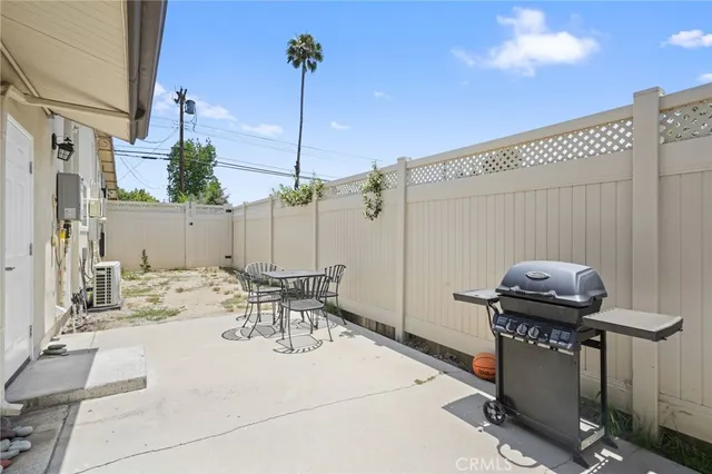 a view of a terrace with furniture