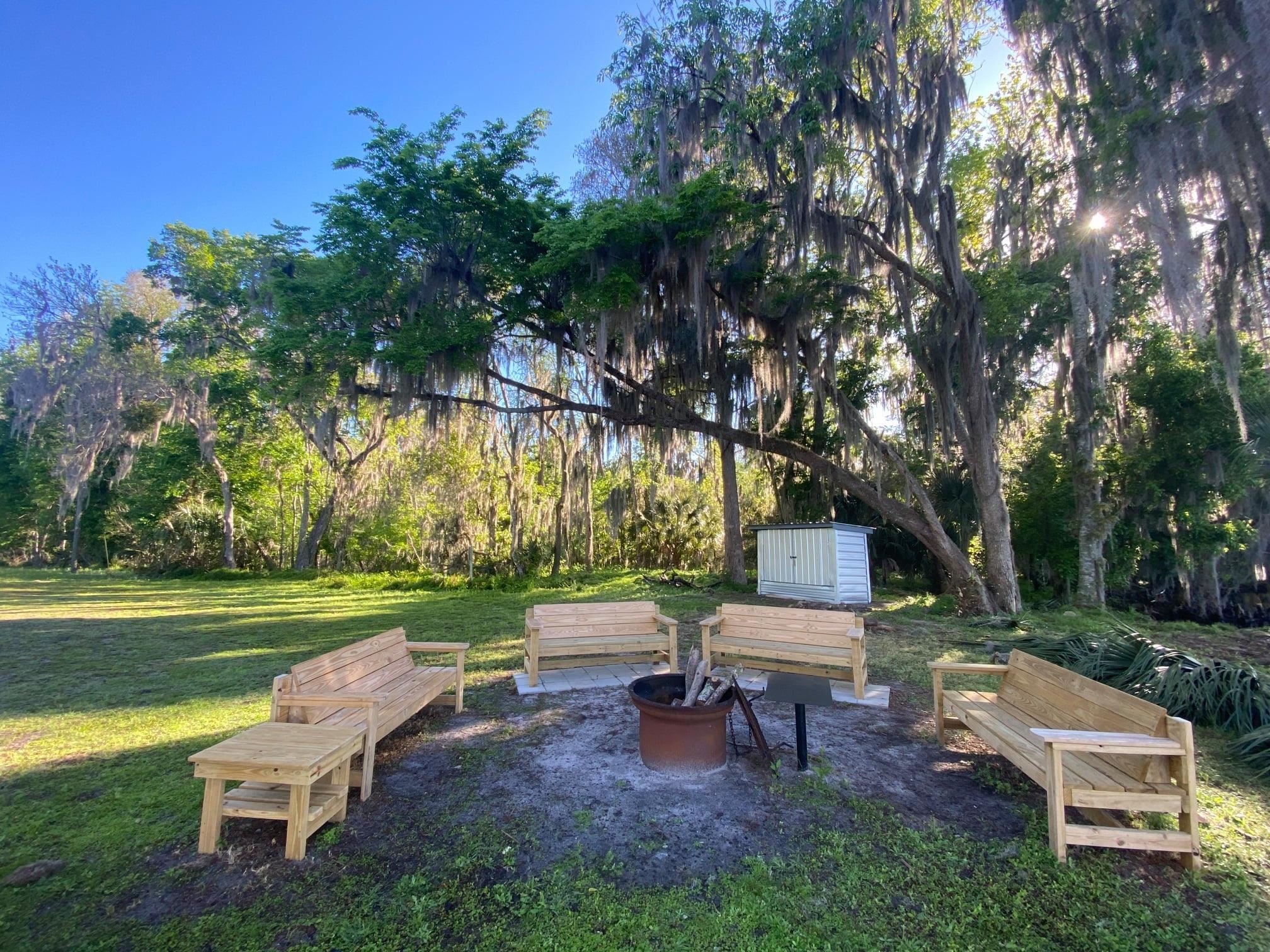243-245 Georgetown Denver Road Georgetown, FL 32139 - Photo 1 of 9 a garden view with a sitting space