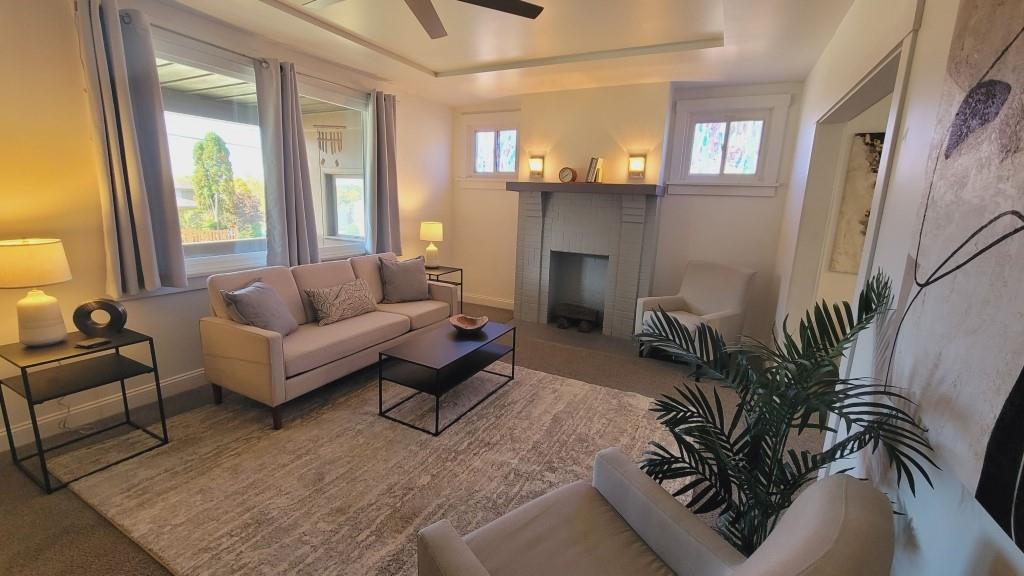 2907 Main Street Homestead, PA 15120 - Photo 2 of 14 a living room with furniture and a fireplace