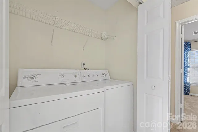 a picture of a bench in front of a wall